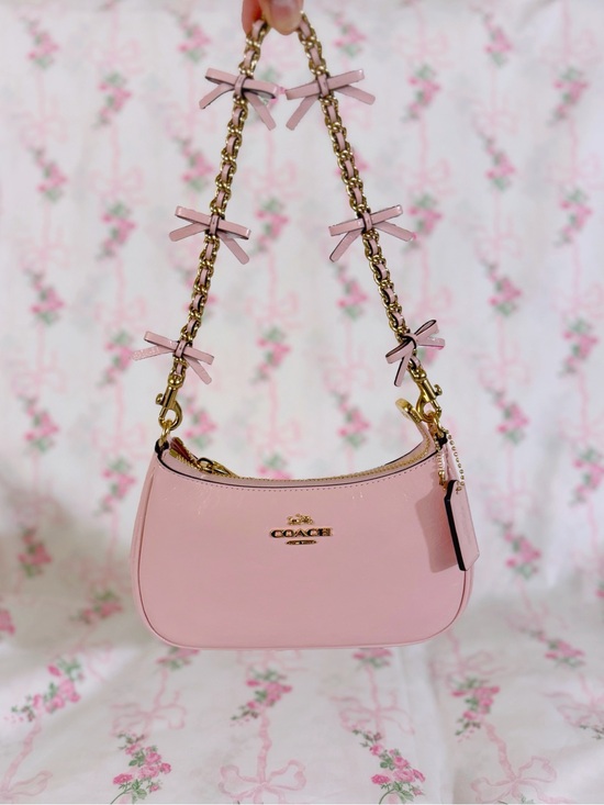 Coach Handbags - Coach Teri Mini Crossbody Bag With Bows in Soft Pink